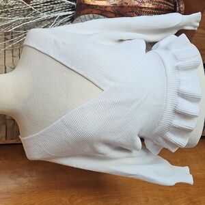 Wing sleeve low cut sweater